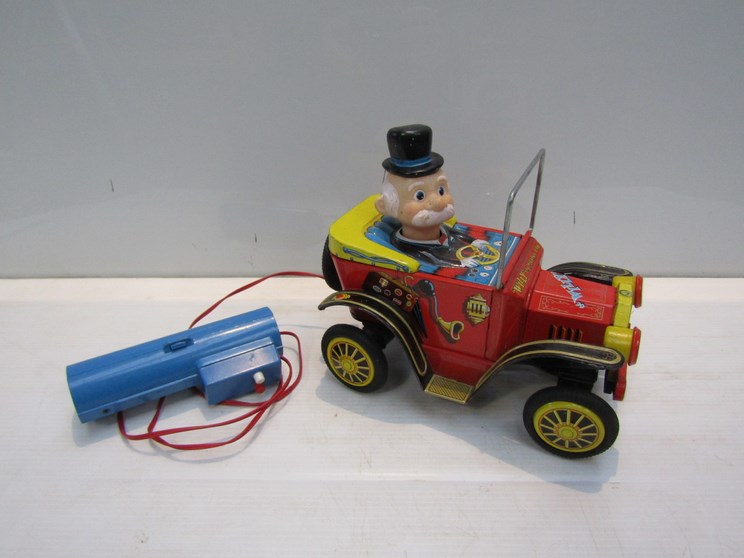 A tinplate "Willy The Walking Car"