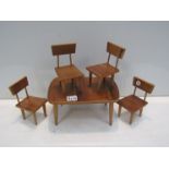A Deco style dolls house extending dining table and four chairs