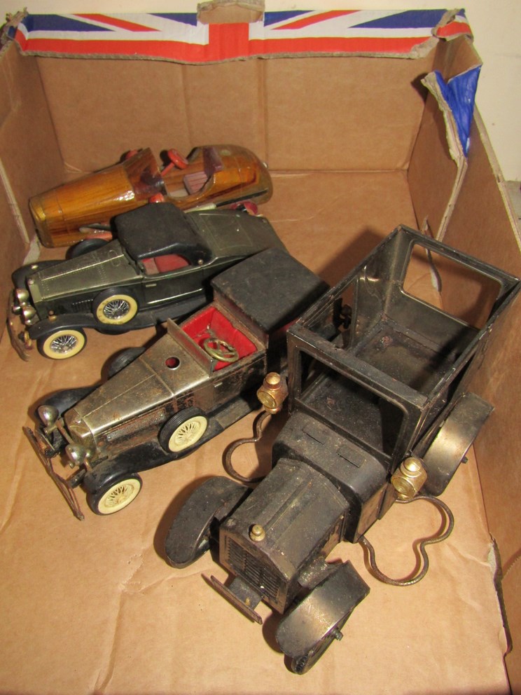 Four vintage model cars