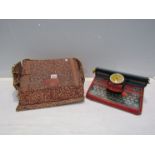 A boxed Mettoy Mettype tinplate typewriter