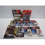 Ten boxed and packaged Johnny Lightning James Bond diecast models including 'What The .......