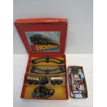 A Hornby '0' gauge box containing mixed '0' gauge locos, wagons etc,