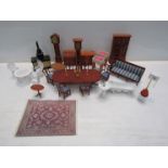 A box of dolls house furniture including dining room suite, aga,