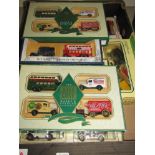 A box of Lledo and Matchbox Models of Yesteryear sets including Hamleys Toy Shop and Marks and