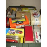 A box of boxed model vehicles including Matchbox,