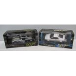 Two boxed Auto Art scale model James Bond vehicles;