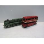 A large tinplate London bus and 4-6-2 railway locomotive