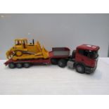 Bruder large scale Scania low loader lorry with Caterpillar tractor
