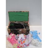 A box of assorted dolls clothes