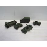 Four unboxed Dinky Toys military vehicles including armored car