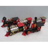 Five plastic battery operated toy train models