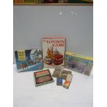 A selection of board and games including Chad Vally Solitaire and De La Rue Playing Cards