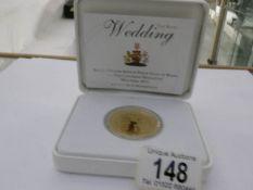 A Royal mint William and Catherine royal wedding silver and gold plate £5 coin