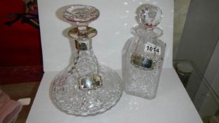 A Waterford crystal decanter with silver collar and silver port label together with a Waterford
