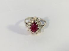 A 14k white gold pear shaped ruby and diamond ring,
