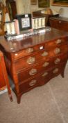 A fine mahogany 18th Century shape fronted chest with gilt chased handles stamped H.