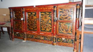 An early Tibetan lacquered hand painted side board