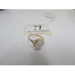 A large opal 9ct gold ring,