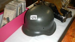 a WW2 German Stalhelm ET64 M42 helmet