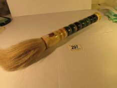 A tribal brush with malachite top