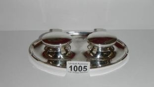 An oval silver inkstand, hall mark indistinct,