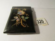 A mother of pearl inlaid card case