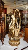 A pair of early French figural table lamps, 34" tall,