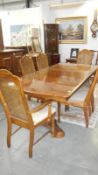 An oak table and 6 chairs