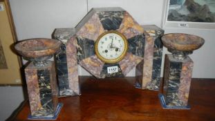 A 3 piece French marble clock garniture