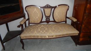 A good Edwardian settee with panelled back