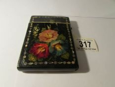 A hand painted lacquered card case, 11 x 7.