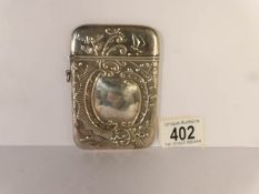 A silver card case marked sterling 925, 10.