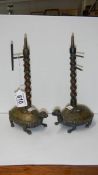 A pair of early bronze taper lamps surmounted on turtles