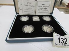A cased set of 4 silver proof £1 coins 1994-1997