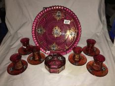 A ruby red hand painted drinking set and tray depicting the King of Persia,