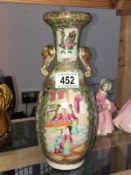 An old Famille Rose two handled vase