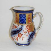 A William Moorcroft 'Aurelain' jug with minor restoration