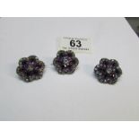 3 gem set white metal brooches