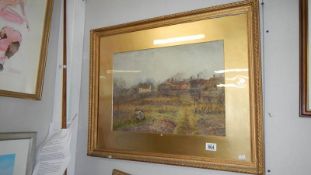 A fine watercolour, rural field with village in background, signed J Clark,