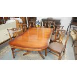 A Chippendale style centre pedestal table and 6 dining chairs