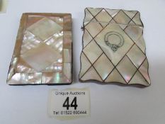 A mother of pearl card case and a French mother of pearl faced note pad