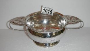 A Celtic silver hammered 2 handled bowl,