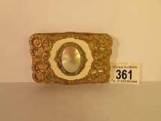 A 19th century gilt trinket box inset with mother of pearl, 9 x 6.