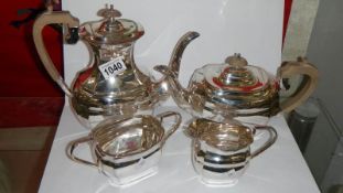 A 4 piece silver tea set comprising tea pot, coffee pot, milk jug and sugar bowl,