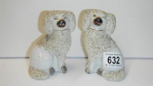 A pair of 19th Century Staffordshire dogs