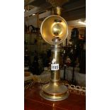 An old brass ship's candle lamp