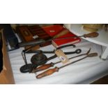 A mixed lot of old ironwork including shoe stretcher for bunions