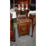 A Victorian walnut and inlaid compendium with inset mirror