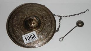 An Indian silver gong