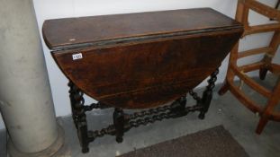An 18th Century oak gate leg table